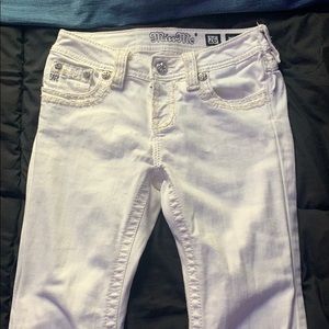 white MissMe bootcut jeans.
